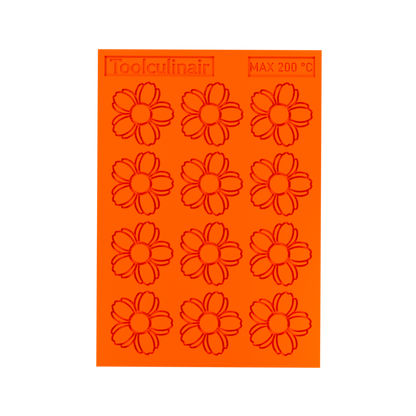 3D render of an orange Toolculinair silicone cherry blossom tuile mold with visible logo, shown in detail without any tuile placed inside the mold cavity.
