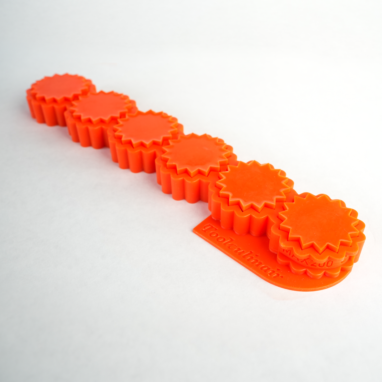 Top view photo of the crimped food safe silicone tartelette mold, highlighting the detailed edge design and flexible material for perfect pastry shells.