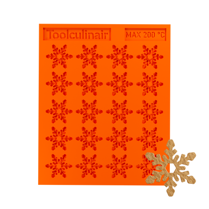 Crystal flake silicone tuile mold with a tuile cookie, ideal for baking decorative and detailed pastries