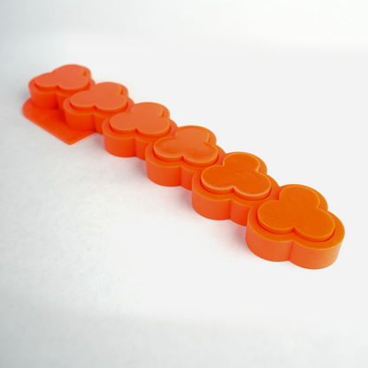 Top view photo of the Flora food safe silicone tartelette mold, highlighting its smooth design and flexible material ideal for crafting perfect pastry shells.
