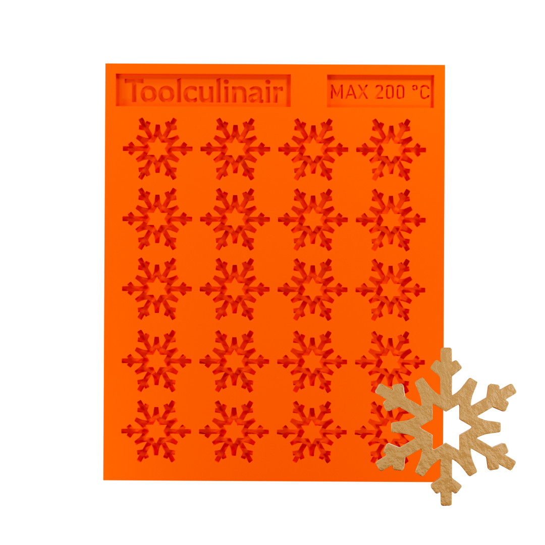 Frost star silicone tuile mold with a tuile cookie, ideal for baking decorative and detailed pastries