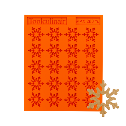 Frost star silicone tuile mold with a tuile cookie, ideal for baking decorative and detailed pastries