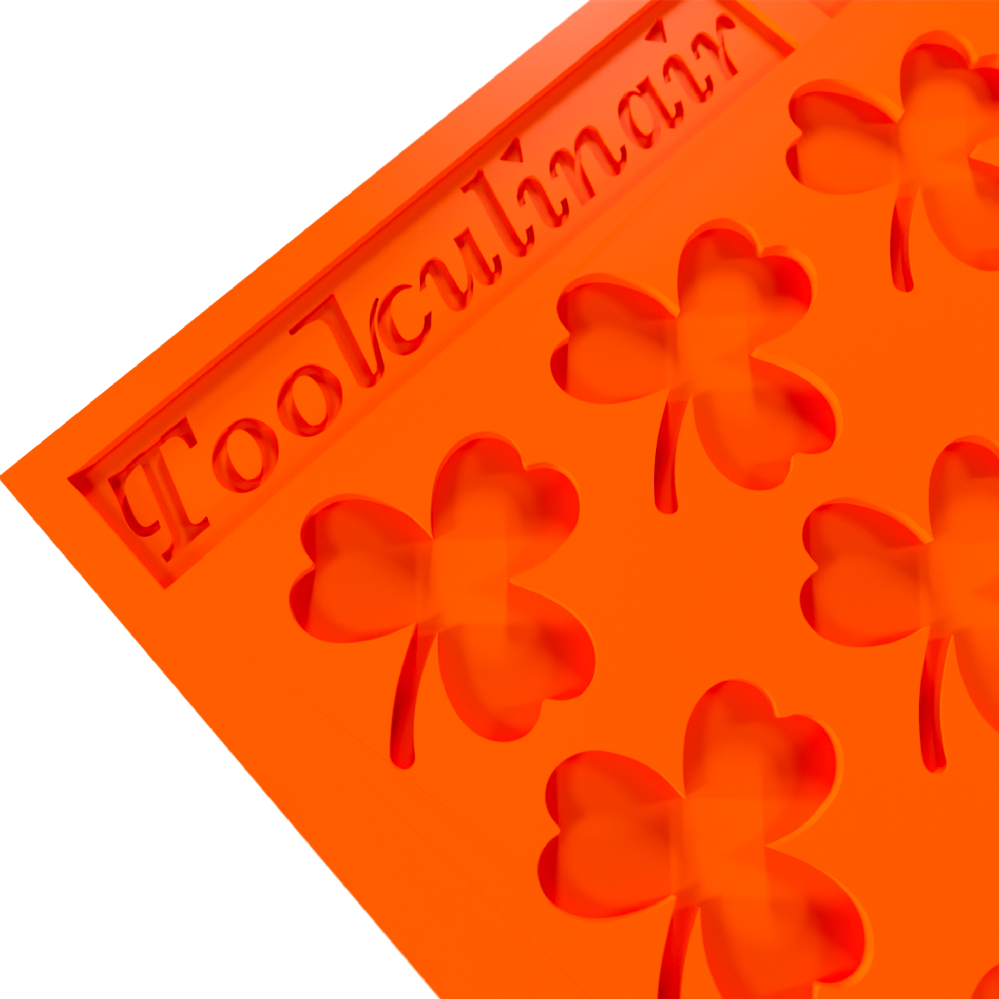 Close up photo of the Green Luck food safe silicone tuile mold, highlighting detailed nature-inspired design and flexible material perfect for elegant pastry creations.