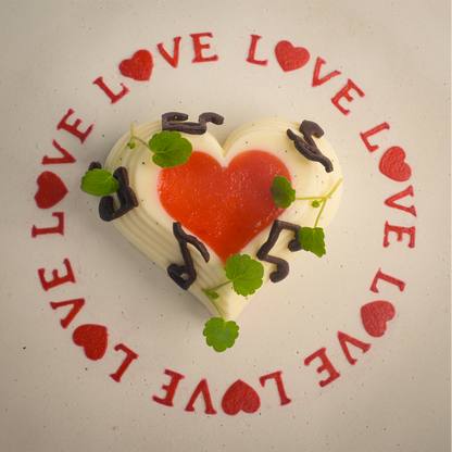 Toolculinair Looped Love stencil result around plated dessert with strawberry gel