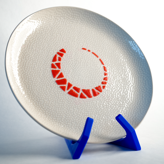 Finished plate with a half-moon design and streaks created using the Moon Streaks silicone stencil.