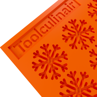 Close-up of a snowflake silicone tuile mold, showing intricate patterns for creating decorative cookies and pastries