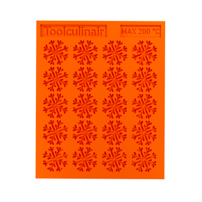 Top view of a snowflake silicone tuile mold, ideal for creating decorative cookies and pastries with intricate designs