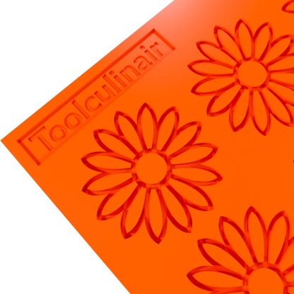 Close-up 3D render of an orange Toolculinair silicone sunflower line art tuile mold, showing a detailed corner view with the Toolculinair logo visible on the mold surface.