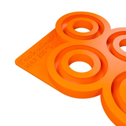 Side view of the Torus 6 cm food safe silicone 3D mold with six ring shaped cavities, designed for creating elegant sweet and savory pastry decorations perfect for starters and main dishes.