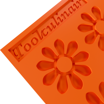 Close-up of Toolculiar's Enneaflower silicone tuile mold for pastry decoration, fine dining, and elegant dessert plating, featuring a detailed nine-petal flower pattern