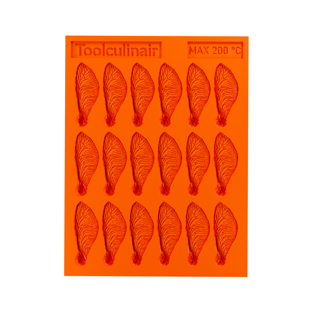 Top view of the Samara silicone tuile mold, highlighting the detailed grooves for creating helicopter seed–inspired tuiles.