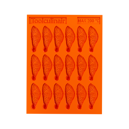 Top view of the Samara silicone tuile mold, highlighting the detailed grooves for creating helicopter seed–inspired tuiles.